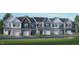 New construction townhouse with attached garage and manicured front lawn at 506 Resteasy Dr, Apex, NC 27539