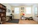 Multipurpose bonus room featuring shelving, desk, and natural light at 516 Ryan Rd, Cary, NC 27511