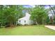 This house has lots of curb appeal, with a manicured lawn and mature trees at 516 Ryan Rd, Cary, NC 27511