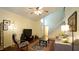 Inviting living room with a ceiling fan, comfortable seating, and stairs leading to the upper level at 516 Ryan Rd, Cary, NC 27511