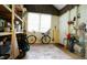 The room has shelving, a bicycle and an exterior door at 516 Ryan Rd, Cary, NC 27511