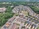 Aerial view of neighborhood featuring mature landscaping and sidewalks at 533 Duchart Ln, Fuquay Varina, NC 27526