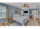 Comfortable bedroom with large windows, neutral tones, and ample space at 533 Duchart Ln, Fuquay Varina, NC 27526