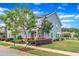 Charming two-story home with blue siding and well-maintained landscaping at 533 Duchart Ln, Fuquay Varina, NC 27526