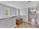 Hallway with wood flooring and a decorative trunk at 533 Duchart Ln, Fuquay Varina, NC 27526