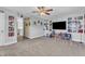 Living room with album art and a sliding barn door at 533 Duchart Ln, Fuquay Varina, NC 27526