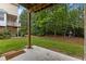 Lush backyard with a patio, a well-maintained lawn, and mature trees, perfect for outdoor enjoyment at 5503 Silver Moon Ln, Raleigh, NC 27606