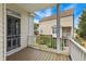 Balcony overlooking a neighboring home with white wood railing, and stained wood flooring at 5503 Silver Moon Ln, Raleigh, NC 27606