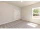 Cozy bedroom with a double door closet and lots of natural light at 56 Braddock Ct, Garner, NC 27529