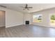 Spacious living room featuring a fireplace, recessed lighting, and outdoor access at 56 Braddock Ct, Garner, NC 27529