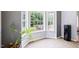 Breakfast nook filled with natural light, offering views of the backyard at 5608 Scottish Hills Dr, Holly Springs, NC 27540