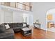 Bright and airy living room with high ceilings and dark wood floors and trim at 5608 Scottish Hills Dr, Holly Springs, NC 27540