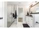 Bathroom featuring a glass shower, granite-topped vanity with drawers, and elegant lighting at 5637 Yates Garden Ln, Raleigh, NC 27606