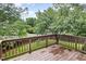 Wooden deck overlooking a lush, green lawn at 5637 Yates Garden Ln, Raleigh, NC 27606