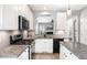 Modern kitchen featuring stainless steel appliances, granite counters and an island at 5637 Yates Garden Ln, Raleigh, NC 27606