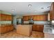 Spacious kitchen with granite countertops, stainless steel appliances, and a center island at 6101 Ricker Rd, Raleigh, NC 27610