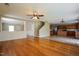 Open concept living space connecting the living room, dining area, and kitchen with stairs visible at 6101 Ricker Rd, Raleigh, NC 27610