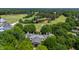 Breathtaking aerial view of this luxury estate with golf course views in a neighborhood setting at 6510 New Market Way, Raleigh, NC 27615