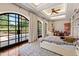 Spacious bedroom with black frame arched glass doors, high ceilings, and stylish decor at 6510 New Market Way, Raleigh, NC 27615