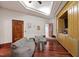 Bonus room featuring recessed lighting, hardwood floors, a wet bar, and comfortable seating at 6510 New Market Way, Raleigh, NC 27615