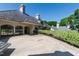 Beautiful home exterior with lush landscaping, stone accents, and elegant architecture at 6510 New Market Way, Raleigh, NC 27615
