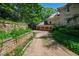 Attached garage with multiple bays and a long, gravel driveway at 6510 New Market Way, Raleigh, NC 27615