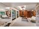 Spacious gym featuring ceiling fans, workout equipment, stone walls, and large mirrors at 6510 New Market Way, Raleigh, NC 27615