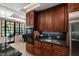 Kitchen featuring custom cabinets, granite countertops, and stainless steel oven at 6510 New Market Way, Raleigh, NC 27615