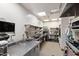 A restaurant-style kitchen features stainless steel workstations and appliances at 6510 New Market Way, Raleigh, NC 27615