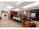 Spacious kitchen featuring an island with barstool seating, granite countertops, and stainless appliances at 6510 New Market Way, Raleigh, NC 27615