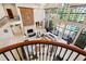 Grand living room features soaring ceilings, expansive windows, fireplace, and elegant decor at 6510 New Market Way, Raleigh, NC 27615