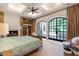 Elegant main bedroom with custom details, fireplace, and access to outdoor space at 6510 New Market Way, Raleigh, NC 27615