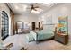 Spacious main bedroom with a sitting area and ample natural light at 6510 New Market Way, Raleigh, NC 27615