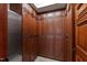 Pantry featuring custom floor-to-ceiling cabinetry and stainless steel refrigerator at 6510 New Market Way, Raleigh, NC 27615