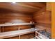 Traditional wooden sauna featuring wooden benches, sauna rocks and heater at 6510 New Market Way, Raleigh, NC 27615