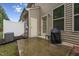 Patio with grill and cozy outdoor space at 68 Holly Berry Ln, Durham, NC 27703