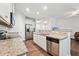 Well-equipped kitchen with stainless steel appliances and ample countertop space at 68 Holly Berry Ln, Durham, NC 27703
