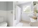 Full bathroom view with tub, shower, toilet, and vanity with storage at 816 Miller Rd, Hillsborough, NC 27278