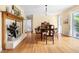 Bright dining room featuring wood floors and a dining set at 816 Miller Rd, Hillsborough, NC 27278