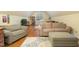Spacious bonus room featuring hardwood floors, neutral walls, and natural light at 8405 Hempton Cross Dr, Wake Forest, NC 27587