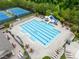 Aerial of the Stonegate community pool with water slide, lap lanes, and lounge chairs at 8405 Hempton Cross Dr, Wake Forest, NC 27587