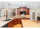 Well-appointed kitchen featuring granite countertops, ample cabinet space, and stainless appliances at 8405 Hempton Cross Dr, Wake Forest, NC 27587