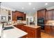 Gourmet kitchen with granite countertops, custom cabinets, and modern appliances at 8405 Hempton Cross Dr, Wake Forest, NC 27587