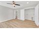 A bright main bedroom has LVP flooring, and a large walk-in closet at 852 Fred Wilder Rd, Franklinton, NC 27525
