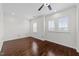An expansive room offers hardwood floors, plantation shutters and modern ceiling fan at 9164 Wooden Rd, Raleigh, NC 27617
