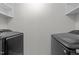 Laundry room featuring shelving, and new washer dryer at 9164 Wooden Rd, Raleigh, NC 27617