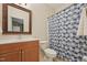 Bathroom featuring a vanity and a shower with blue patterned curtain at 9808 Rainsong Dr, Wake Forest, NC 27587