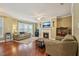 Spacious living room with fireplace and hardwood flooring at 9808 Rainsong Dr, Wake Forest, NC 27587