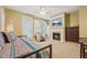 Cozy main bedroom with fireplace and private balcony access at 9808 Rainsong Dr, Wake Forest, NC 27587