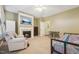 Inviting main bedroom features a fireplace and comfortable seating area at 9808 Rainsong Dr, Wake Forest, NC 27587